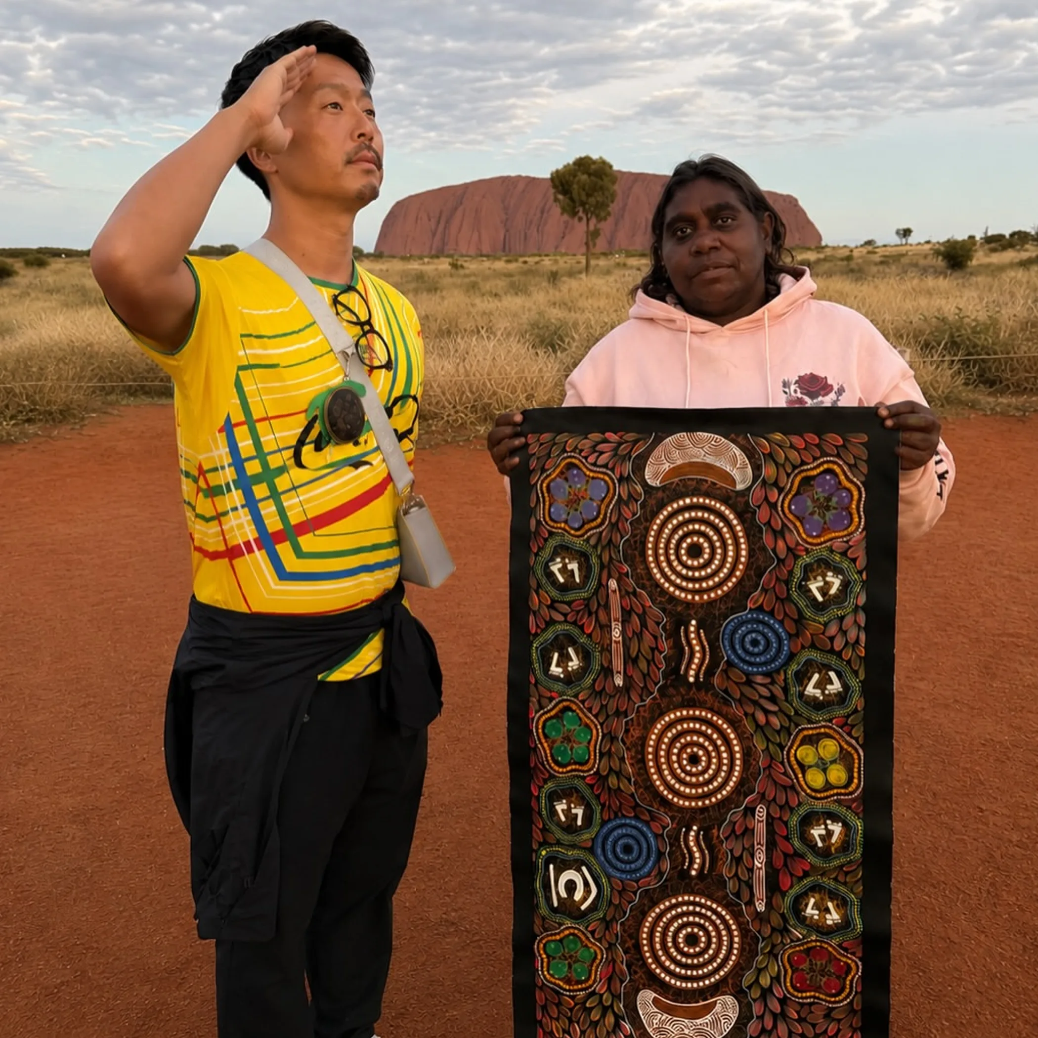 uluru rock with cultural art designs